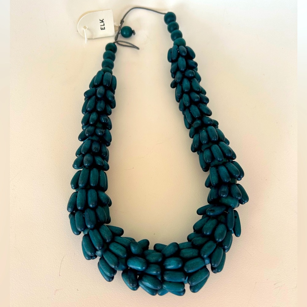 Elk the Label multi strand hand painted wood necklace.